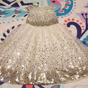 A gold and silver sequin dress